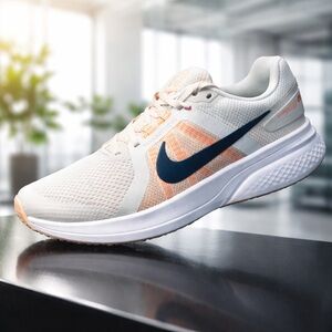 Nike Run Swift 2 . White and Orange Athletic Shoes . Men size 9 or women 10.5